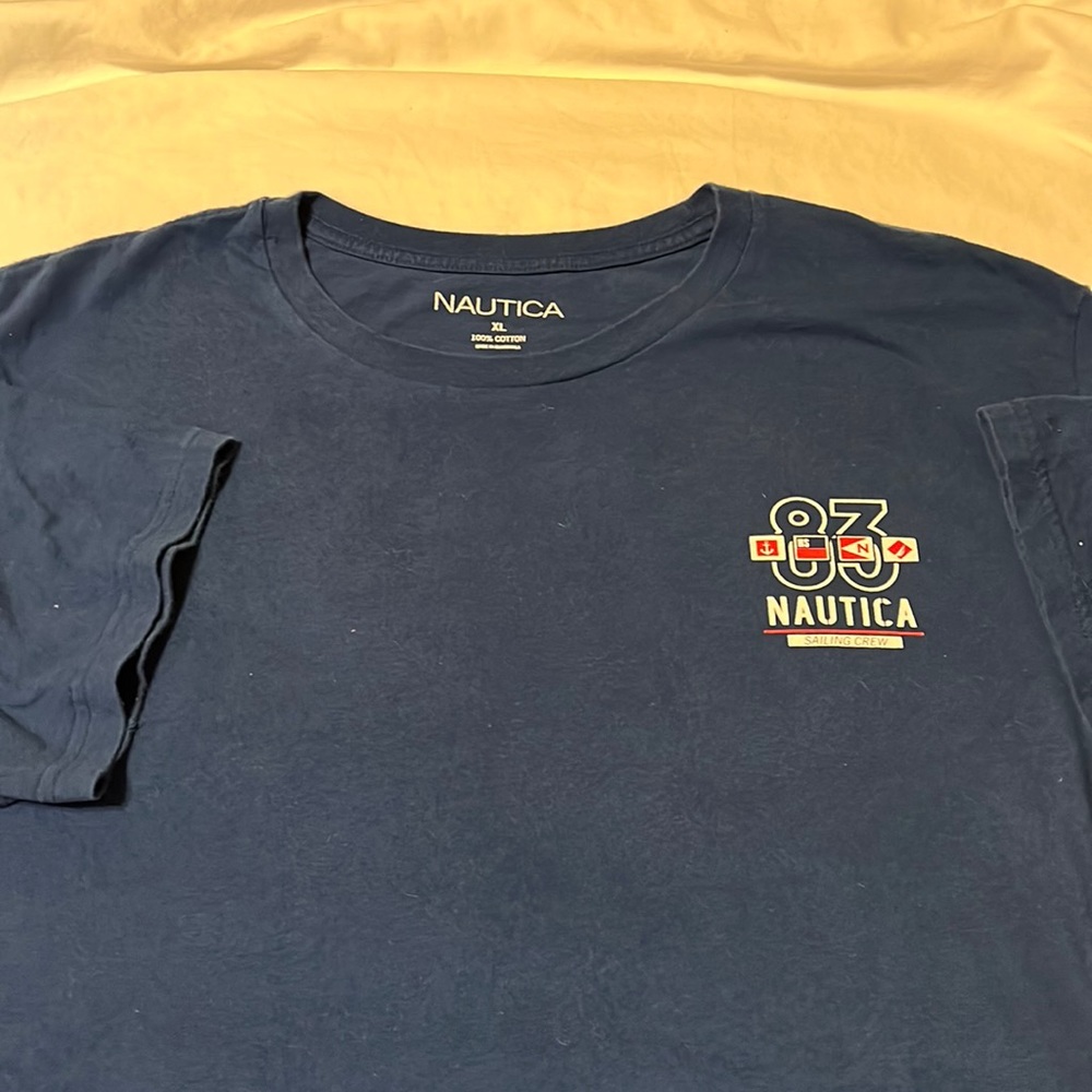 NAUTICA S/S T- SHIRT! Royal blue. Worn once maybe! Graphics on front &  Back &15